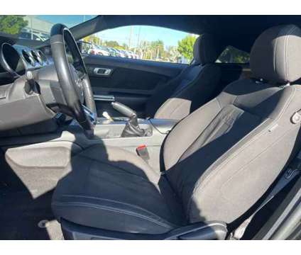 2019 Ford Mustang GT is a Black 2019 Ford Mustang GT Coupe in Fort Pierce FL