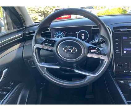 2022 Hyundai Tucson SEL is a Grey 2022 Hyundai Tucson SUV in Milwaukee WI