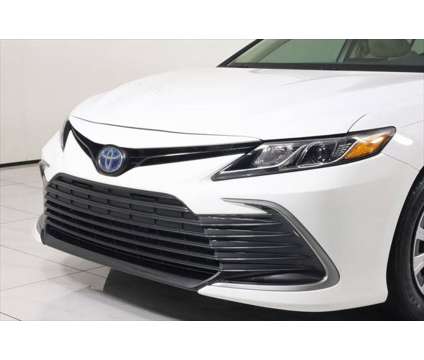 2021 Toyota Camry LE Hybrid is a White 2021 Toyota Camry LE Hybrid in Westfield IN