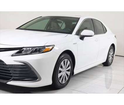 2021 Toyota Camry LE Hybrid is a White 2021 Toyota Camry LE Hybrid in Westfield IN