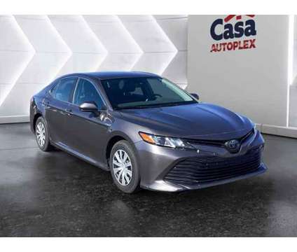 2020 Toyota Camry LE Hybrid is a Grey 2020 Toyota Camry LE Hybrid in Las Cruces NM