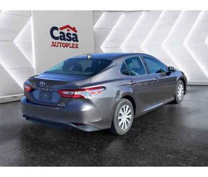 2020 Toyota Camry LE Hybrid is a Grey 2020 Toyota Camry LE Hybrid in Las Cruces NM