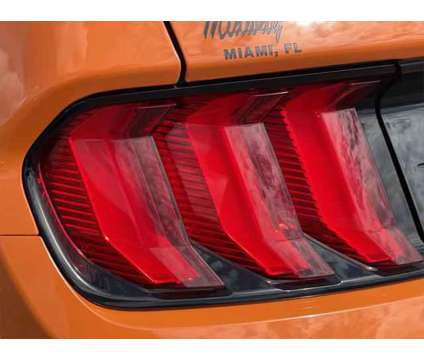 2021 Ford Mustang EcoBoost Fastback is a Orange 2021 Ford Mustang EcoBoost Coupe in Leesburg FL