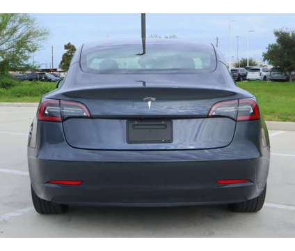 2021 Tesla Model 3 Standard Range Plus is a Silver 2021 Tesla Model 3 Sedan in Friendswood TX