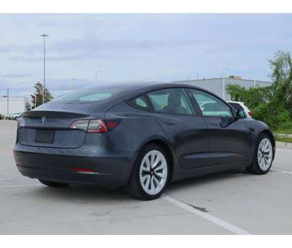 2021 Tesla Model 3 Standard Range Plus is a Silver 2021 Tesla Model 3 Sedan in Friendswood TX