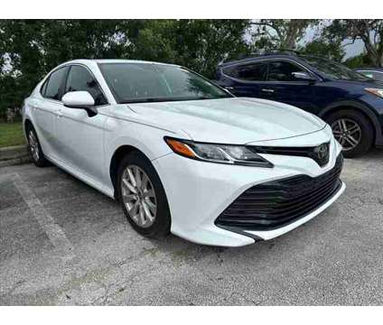 2020 Toyota Camry LE is a White 2020 Toyota Camry LE Car for Sale in Cocoa FL