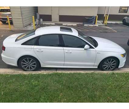 2016 Audi A6 3.0T Premium Plus is a White 2016 Audi A6 3.0T Premium Sedan in Bowie MD