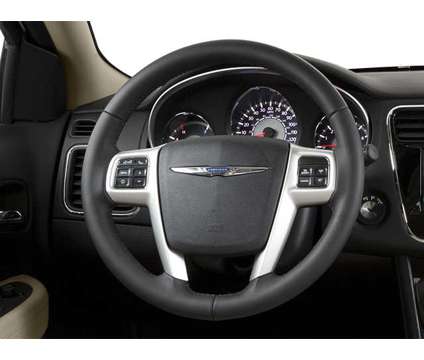 2014 Chrysler 200 LX is a Silver 2014 Chrysler 200 Model LX Sedan in Milwaukee WI