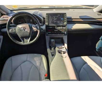 2019 Toyota Avalon XLE is a Black 2019 Toyota Avalon XLE Sedan in Jacksonville FL