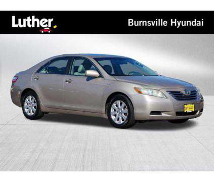 2009 Toyota Camry Hybrid 4dr Sdn is a Tan 2009 Toyota Camry Hybrid Hybrid in Burnsville MN