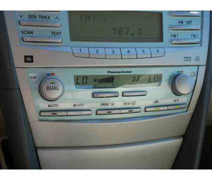 2009 Toyota Camry Hybrid 4dr Sdn is a Tan 2009 Toyota Camry Hybrid Hybrid in Burnsville MN