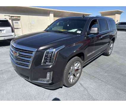 2018 Cadillac Escalade Esv Platinum Edition is a Grey 2018 Cadillac Escalade ESV Platinum Car for Sale in Henderson NV