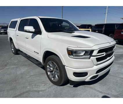 2020 Ram 1500 Laramie is a White 2020 RAM 1500 Model Laramie Car for Sale in Henderson NV