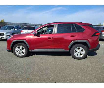 2021 Toyota RAV4 XLE is a Red 2021 Toyota RAV4 XLE SUV in Farmingdale NY