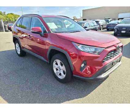 2021 Toyota RAV4 XLE is a Red 2021 Toyota RAV4 XLE SUV in Farmingdale NY