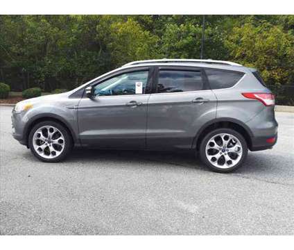 2014 Ford Escape Titanium is a Grey 2014 Ford Escape Titanium Car for Sale in Winston Salem NC