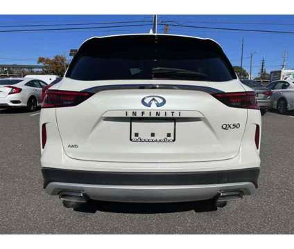 2019 Infiniti QX50 LUXE is a White 2019 Infiniti QX50 Luxe Station Wagon in Massapequa NY