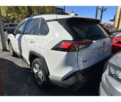 2019 Toyota RAV4 Hybrid XLE is a White 2019 Toyota RAV4 Hybrid XLE Hybrid in Bayside NY