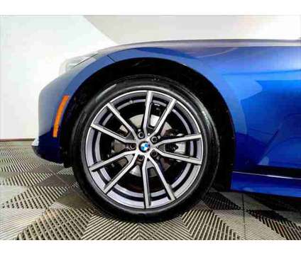 2022 BMW 3 Series xDrive is a Blue 2022 BMW 3-Series Sedan in Freeport NY