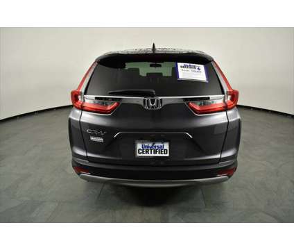 2018 Honda CR-V EX is a Grey 2018 Honda CR-V EX SUV in Orlando FL