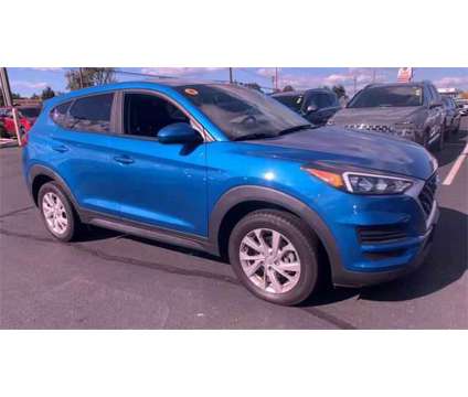 2019 Hyundai Tucson SE is a Blue 2019 Hyundai Tucson SE SUV in Hartford CT