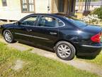 2009 Buick Lacrosse 4 door.... Black with Black interior