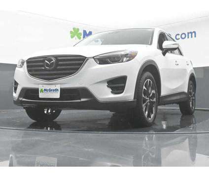 2016 Mazda CX-5 Grand Touring is a White 2016 Mazda CX-5 Grand Touring SUV in Dubuque IA