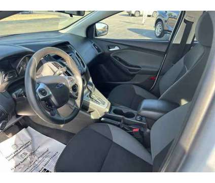 2013 Ford Focus SE is a Silver 2013 Ford Focus SE Sedan in Dubuque IA