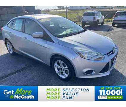 2013 Ford Focus SE is a Silver 2013 Ford Focus SE Sedan in Dubuque IA