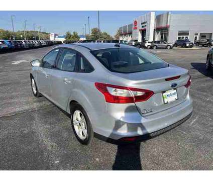 2013 Ford Focus SE is a Silver 2013 Ford Focus SE Sedan in Dubuque IA