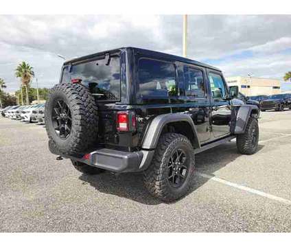 2024 Jeep Wrangler Willys is a Black 2024 Jeep Wrangler Car for Sale in Orlando FL