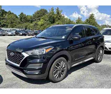 2020 Hyundai Tucson SEL is a Black 2020 Hyundai Tucson SUV in Auburn AL