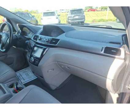 2014 Honda Odyssey EX-L is a 2014 Honda Odyssey EX Van in Dubuque IA