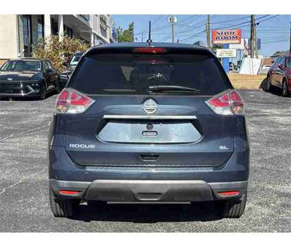 2016 Nissan Rogue SL is a Blue 2016 Nissan Rogue SL Station Wagon in Auburn AL