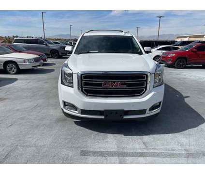 2020 Gmc Yukon SLT is a White 2020 GMC Yukon SLT Car for Sale in Henderson NV