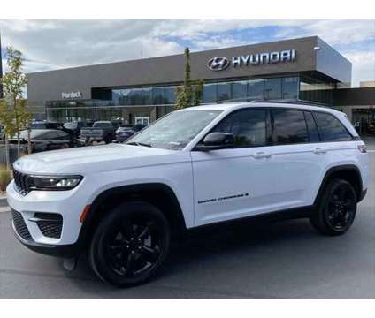 2023 Jeep Grand Cherokee Altitude 4x4 is a White 2023 Jeep grand cherokee Altitude SUV in Lindon UT