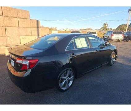 2014 Toyota Camry XLE is a Black 2014 Toyota Camry XLE Sedan in Dubuque IA