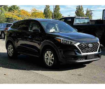 2021 Hyundai Tucson SE is a Black 2021 Hyundai Tucson SE SUV in Medford NY