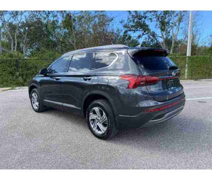 2023 Hyundai Santa Fe SEL is a Grey 2023 Hyundai Santa Fe SUV in New Port Richey FL