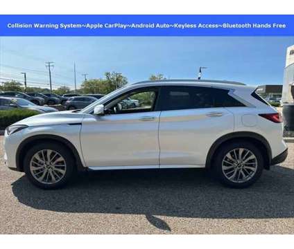 2023 Infiniti QX50 LUXE is a White 2023 Infiniti QX50 Luxe Station Wagon in Akron OH