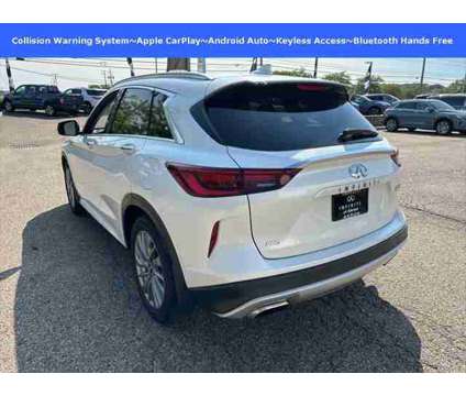 2023 Infiniti QX50 LUXE is a White 2023 Infiniti QX50 Luxe Station Wagon in Akron OH