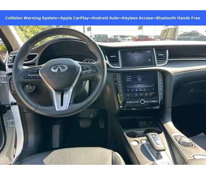 2023 Infiniti QX50 LUXE is a White 2023 Infiniti QX50 Luxe Station Wagon in Akron OH