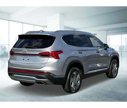 2021 Hyundai Santa Fe SEL is a Silver 2021 Hyundai Santa Fe SUV in Medford NY