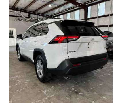 2019 Toyota RAV4 for sale is a White 2019 Toyota RAV4 4dr Car for Sale in Houston TX