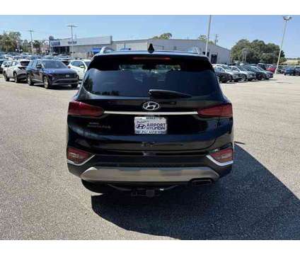 2020 Hyundai Santa Fe SEL 2.4 is a Black 2020 Hyundai Santa Fe SUV in Mobile AL