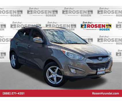 2013 Hyundai Tucson GLS is a Tan 2013 Hyundai Tucson GLS SUV in Algonquin IL