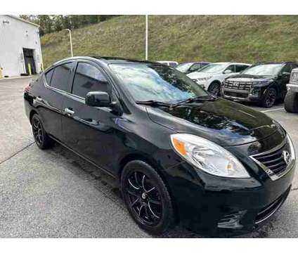 2013 Nissan Versa 1.6 SV is a Black 2013 Nissan Versa 1.6 Trim Car for Sale in Indiana PA