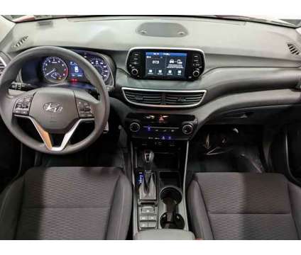 2021 Hyundai Tucson SE is a Red 2021 Hyundai Tucson SE SUV in Wayne NJ