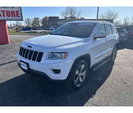 2014 Jeep Grand Cherokee Limited is a White 2014 Jeep grand cherokee Limited SUV in Dubuque IA