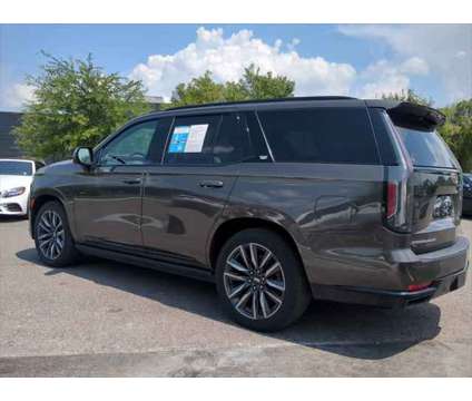 2021 Cadillac Escalade 2WD Sport is a Brown 2021 Cadillac Escalade Car for Sale in Jacksonville FL